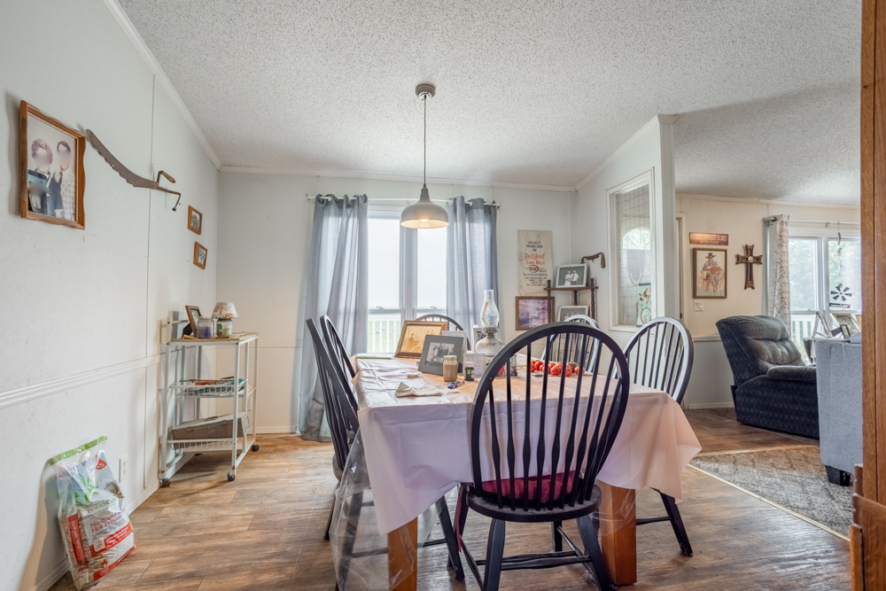 Sprawling Century Farm and Ranch with Pastures, Ponds, Hay Fields, Barns and a Home