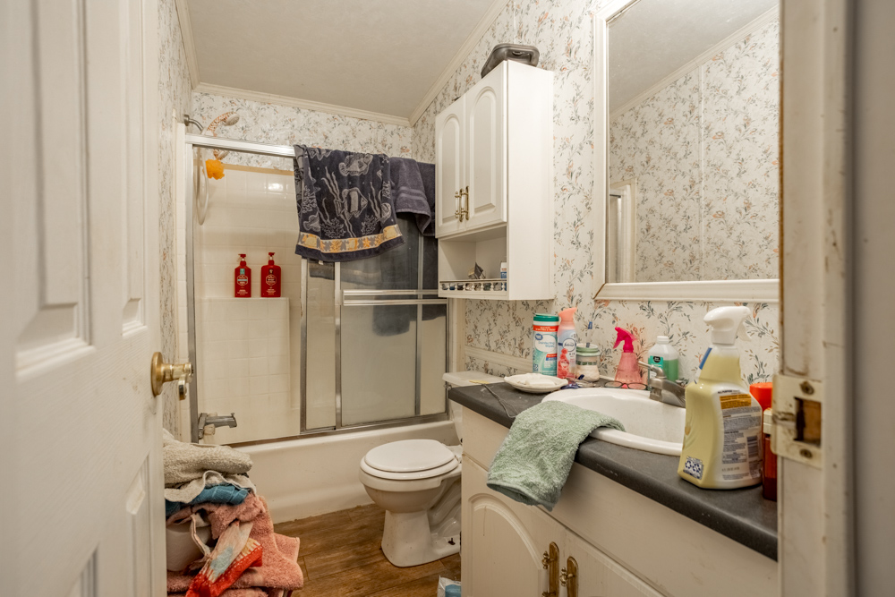 Sprawling Century Farm and Ranch with Pastures, Ponds, Hay Fields, Barns and a Home