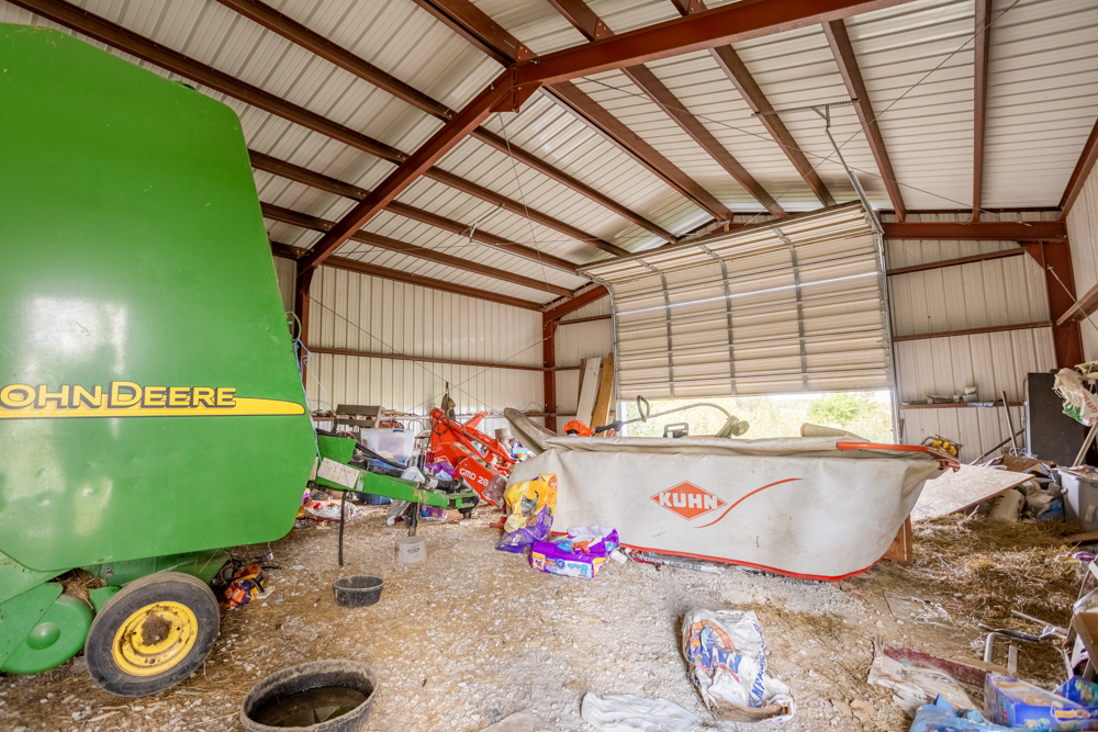 Sprawling Century Farm and Ranch with Pastures, Ponds, Hay Fields, Barns and a Home