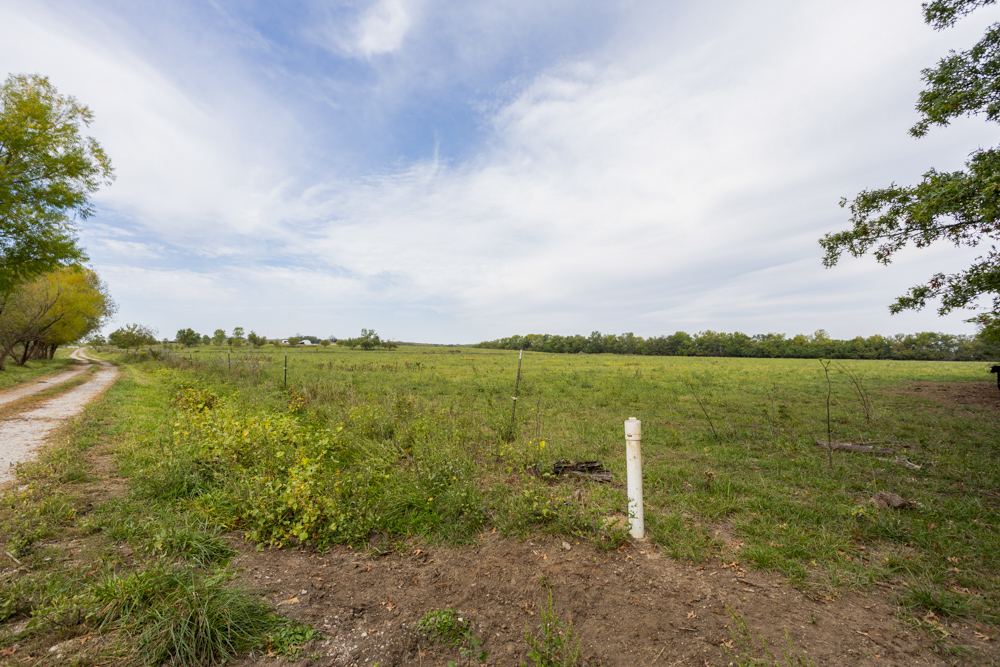 Sprawling Century Farm and Ranch with Pastures, Ponds, Hay Fields, Barns and a Home