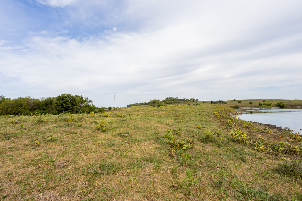 Sprawling Century Farm and Ranch with Pastures, Ponds, Hay Fields, Barns and a Home