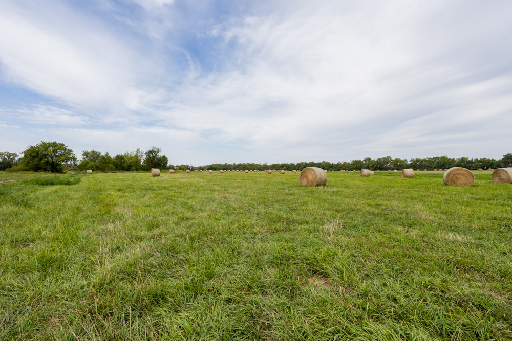 Sprawling Century Farm and Ranch with Pastures, Ponds, Hay Fields, Barns and a Home