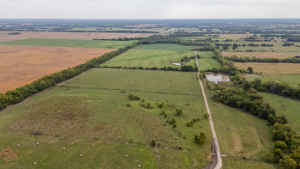 Sprawling Century Farm and Ranch with Pastures, Ponds, Hay Fields, Barns and a Home