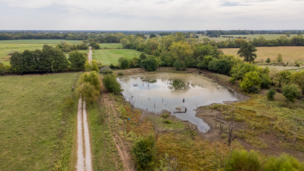 Sprawling Century Farm and Ranch with Pastures, Ponds, Hay Fields, Barns and a Home