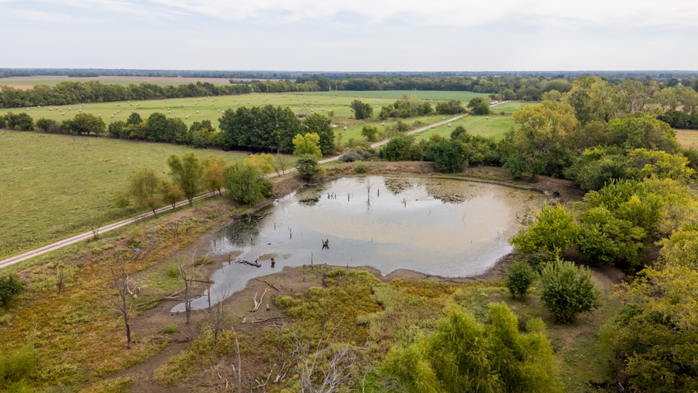 Sprawling Century Farm and Ranch with Pastures, Ponds, Hay Fields, Barns and a Home