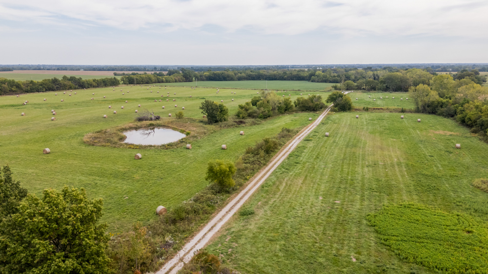 Sprawling Century Farm and Ranch with Pastures, Ponds, Hay Fields, Barns and a Home