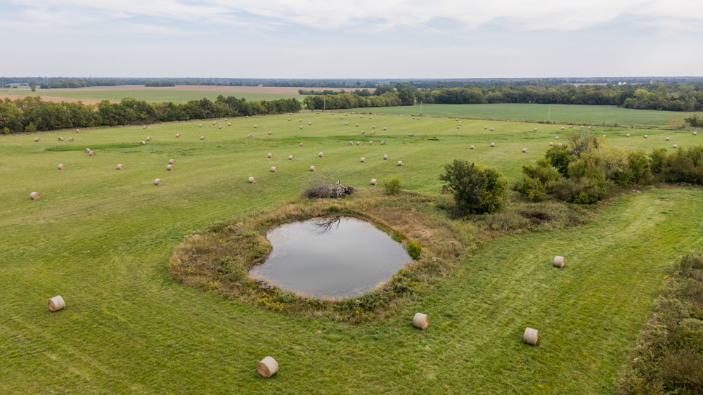 Sprawling Century Farm and Ranch with Pastures, Ponds, Hay Fields, Barns and a Home