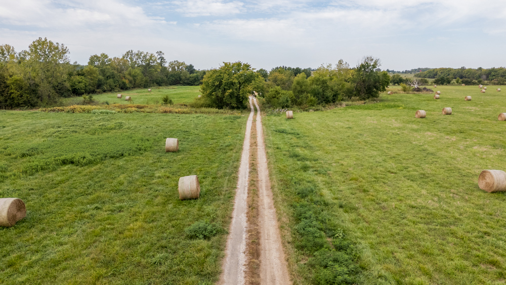 Sprawling Century Farm and Ranch with Pastures, Ponds, Hay Fields, Barns and a Home