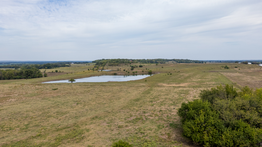Sprawling Century Farm and Ranch with Pastures, Ponds, Hay Fields, Barns and a Home