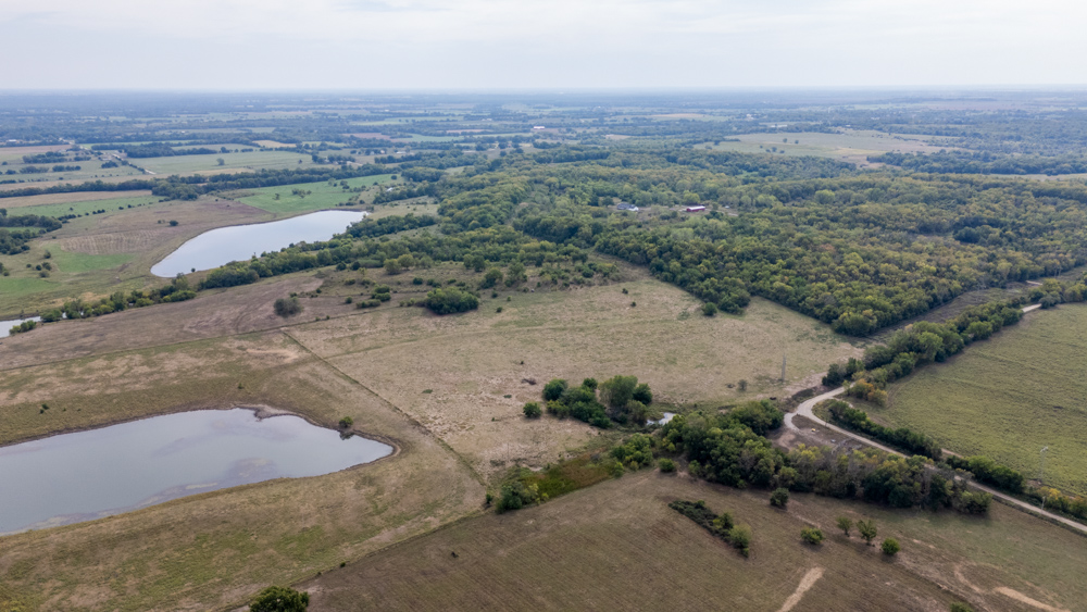 Sprawling Century Farm and Ranch with Pastures, Ponds, Hay Fields, Barns and a Home