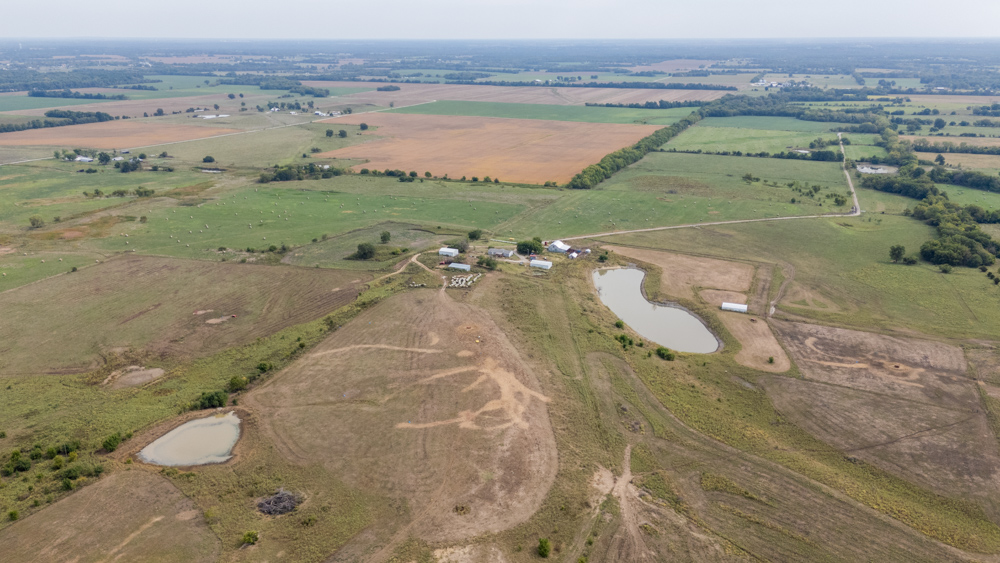 Sprawling Century Farm and Ranch with Pastures, Ponds, Hay Fields, Barns and a Home