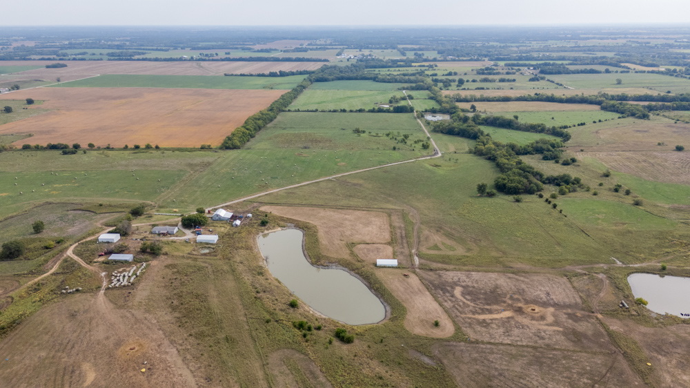 Sprawling Century Farm and Ranch with Pastures, Ponds, Hay Fields, Barns and a Home
