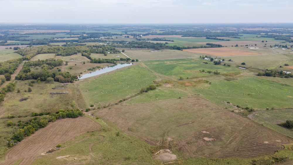 Sprawling Century Farm and Ranch with Pastures, Ponds, Hay Fields, Barns and a Home