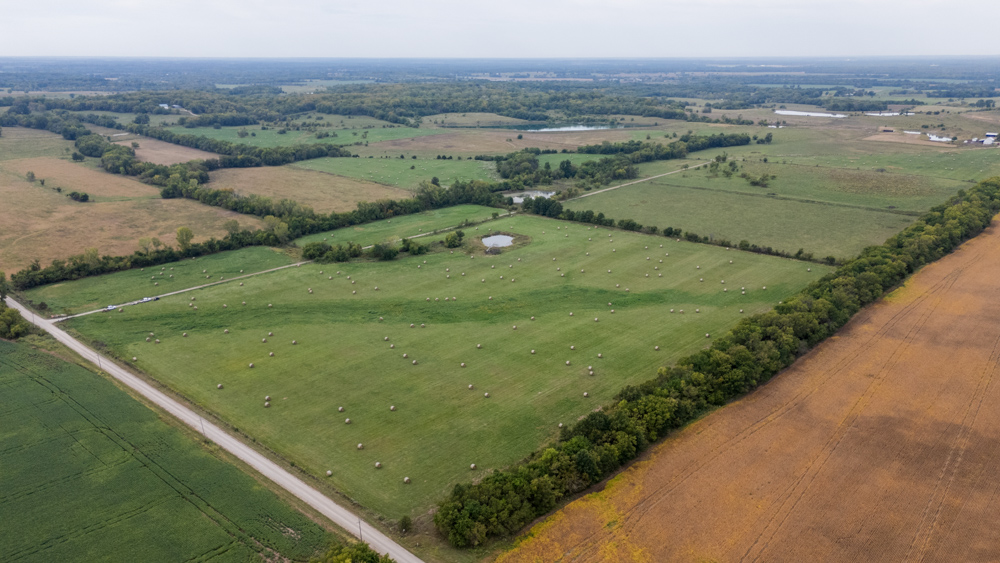 Sprawling Century Farm and Ranch with Pastures, Ponds, Hay Fields, Barns and a Home