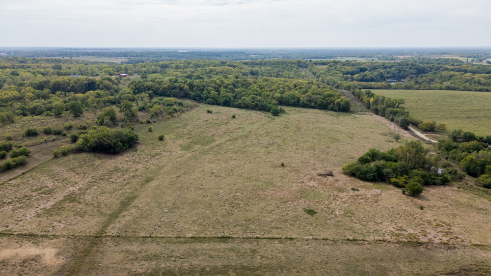 Sprawling Century Farm and Ranch with Pastures, Ponds, Hay Fields, Barns and a Home