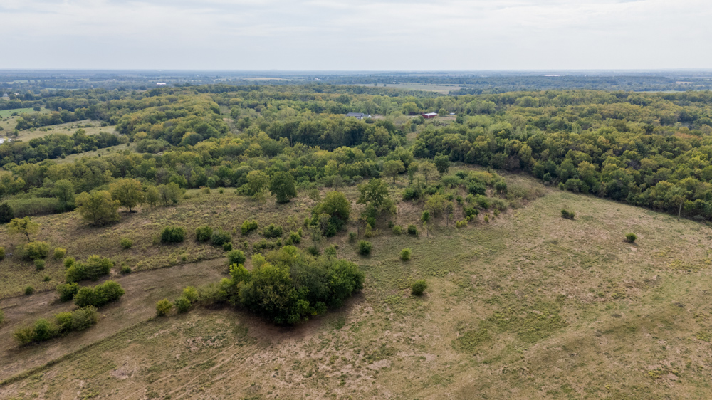 Sprawling Century Farm and Ranch with Pastures, Ponds, Hay Fields, Barns and a Home