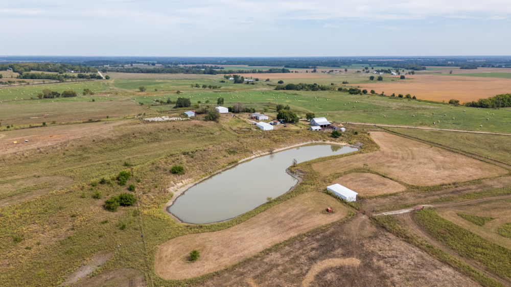 Sprawling Century Farm and Ranch with Pastures, Ponds, Hay Fields, Barns and a Home