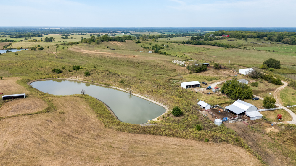 Sprawling Century Farm and Ranch with Pastures, Ponds, Hay Fields, Barns and a Home