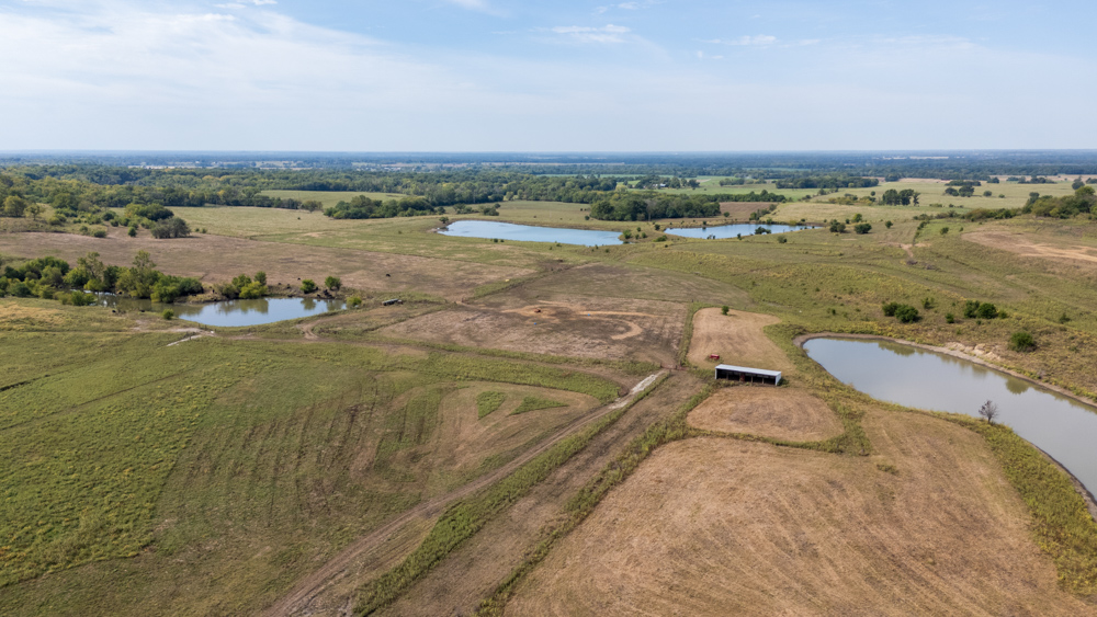 Sprawling Century Farm and Ranch with Pastures, Ponds, Hay Fields, Barns and a Home
