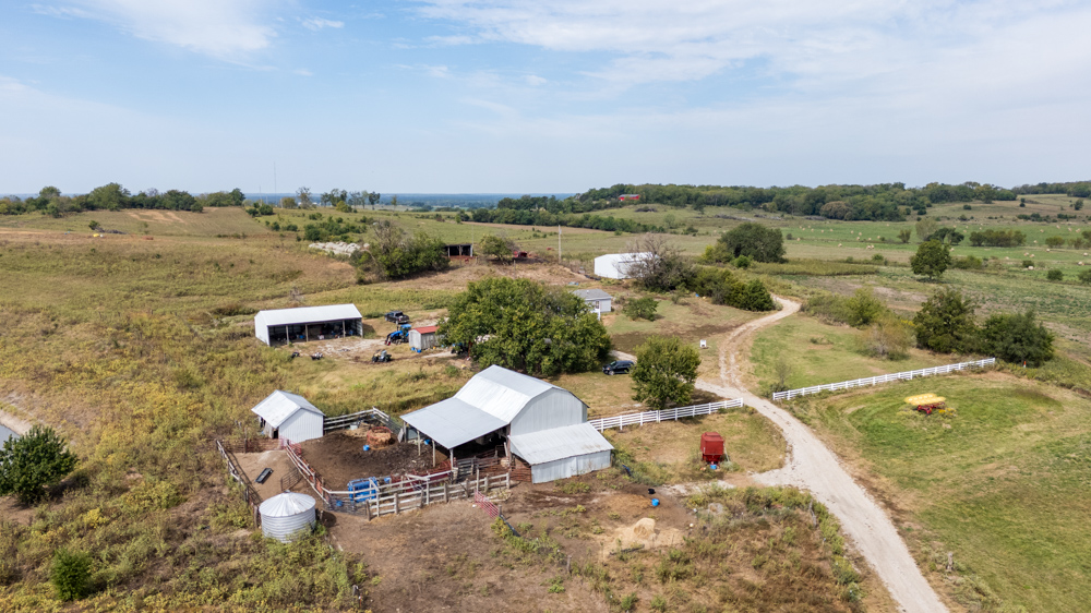 Sprawling Century Farm and Ranch with Pastures, Ponds, Hay Fields, Barns and a Home