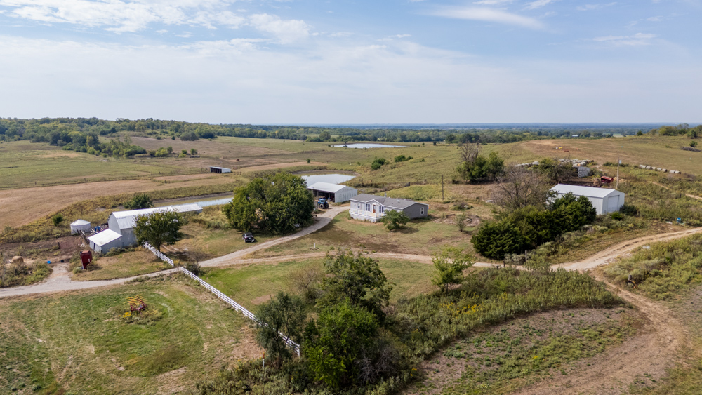 Sprawling Century Farm and Ranch with Pastures, Ponds, Hay Fields, Barns and a Home