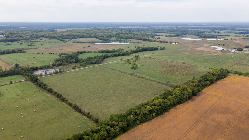 Sprawling Century Farm and Ranch with Pastures, Ponds, Hay Fields, Barns and a Home