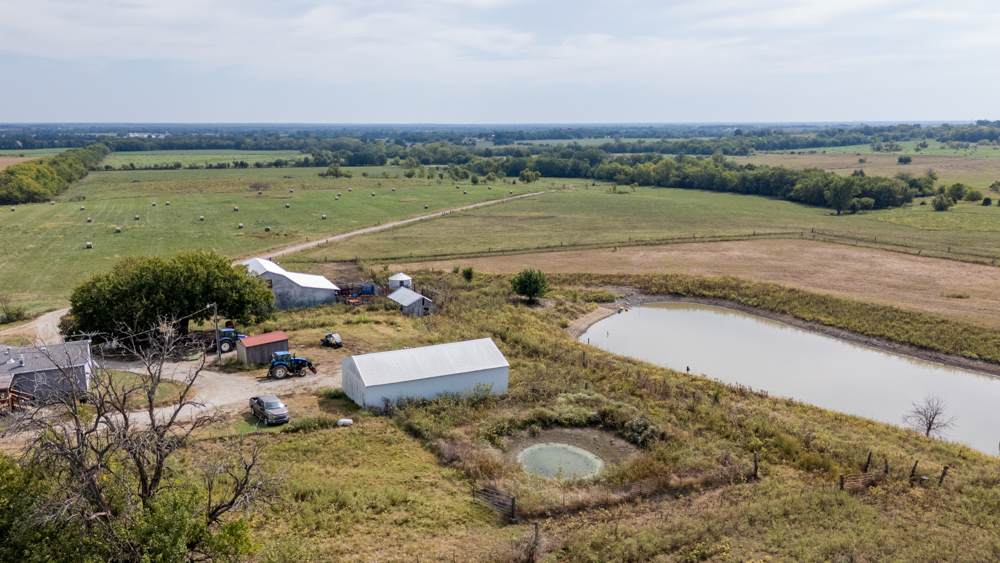 Sprawling Century Farm and Ranch with Pastures, Ponds, Hay Fields, Barns and a Home