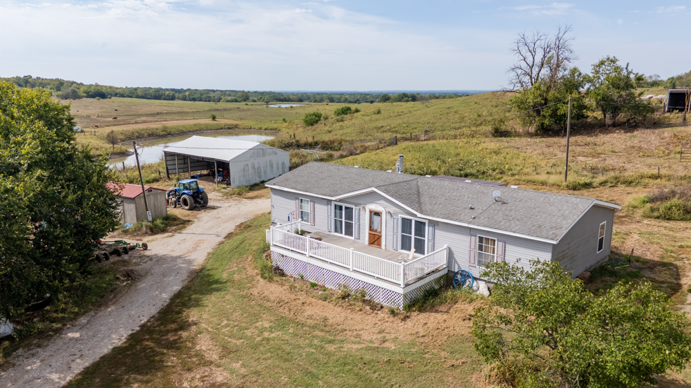 Sprawling Century Farm and Ranch with Pastures, Ponds, Hay Fields, Barns and a Home