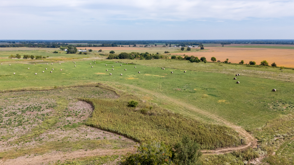 Sprawling Century Farm and Ranch with Pastures, Ponds, Hay Fields, Barns and a Home