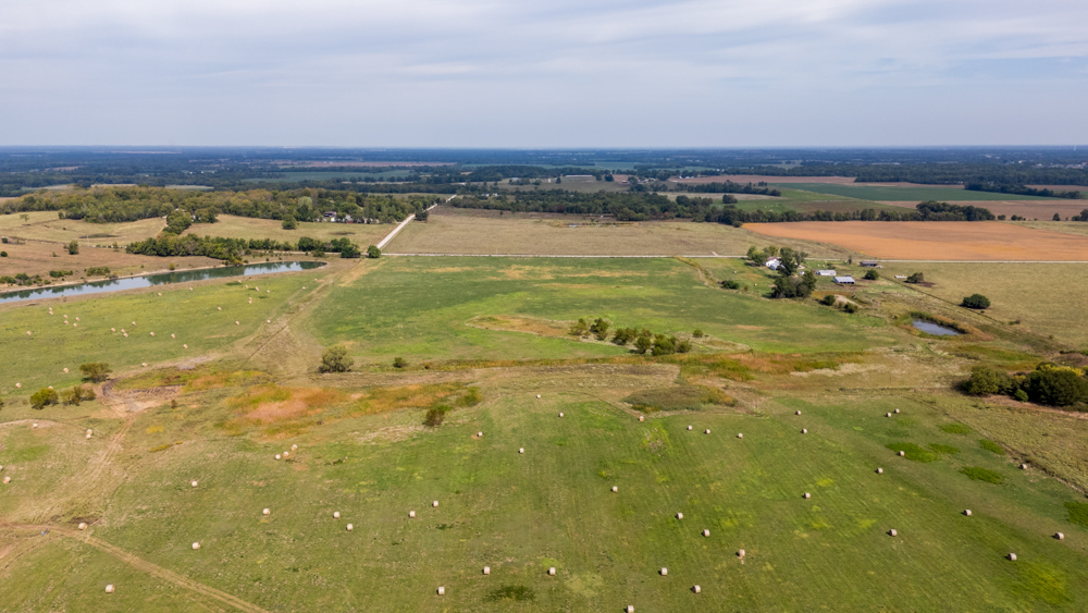 Sprawling Century Farm and Ranch with Pastures, Ponds, Hay Fields, Barns and a Home