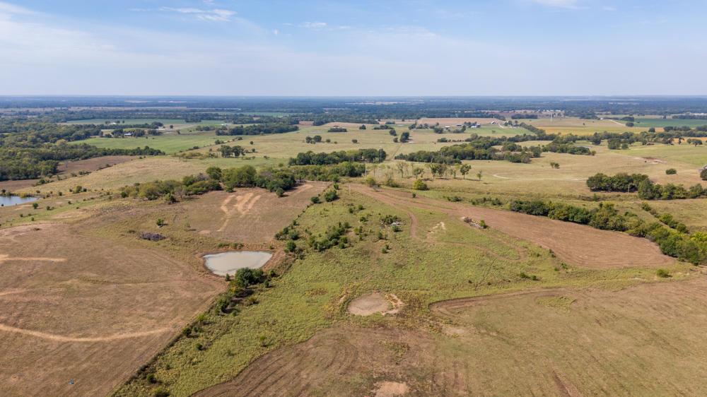 Sprawling Century Farm and Ranch with Pastures, Ponds, Hay Fields, Barns and a Home