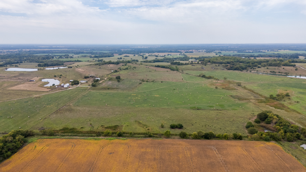 Sprawling Century Farm and Ranch with Pastures, Ponds, Hay Fields, Barns and a Home