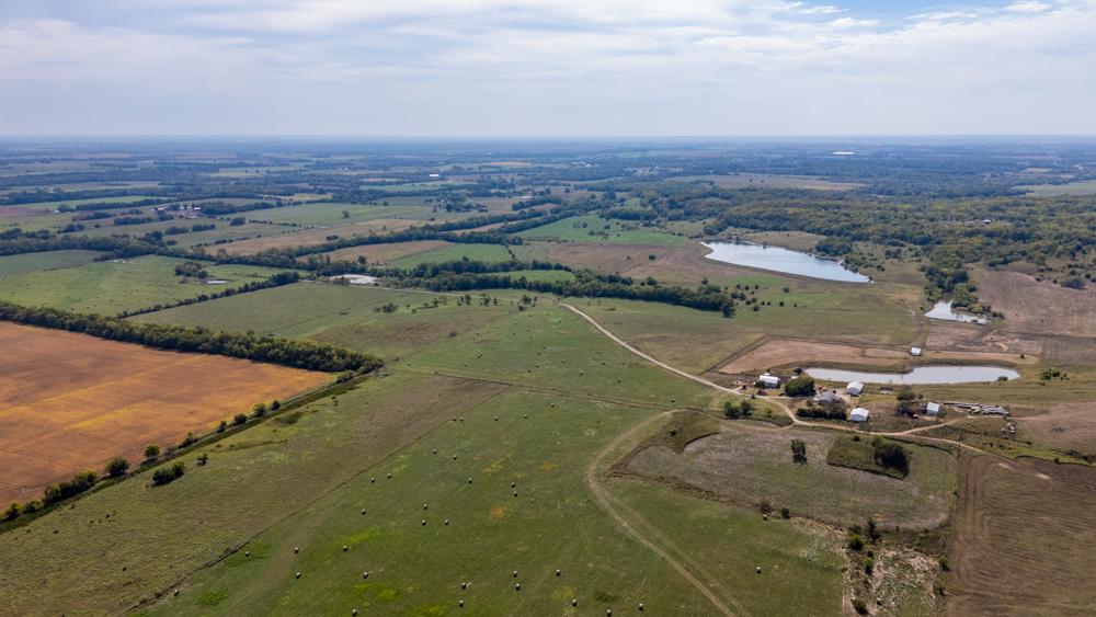 Sprawling Century Farm and Ranch with Pastures, Ponds, Hay Fields, Barns and a Home