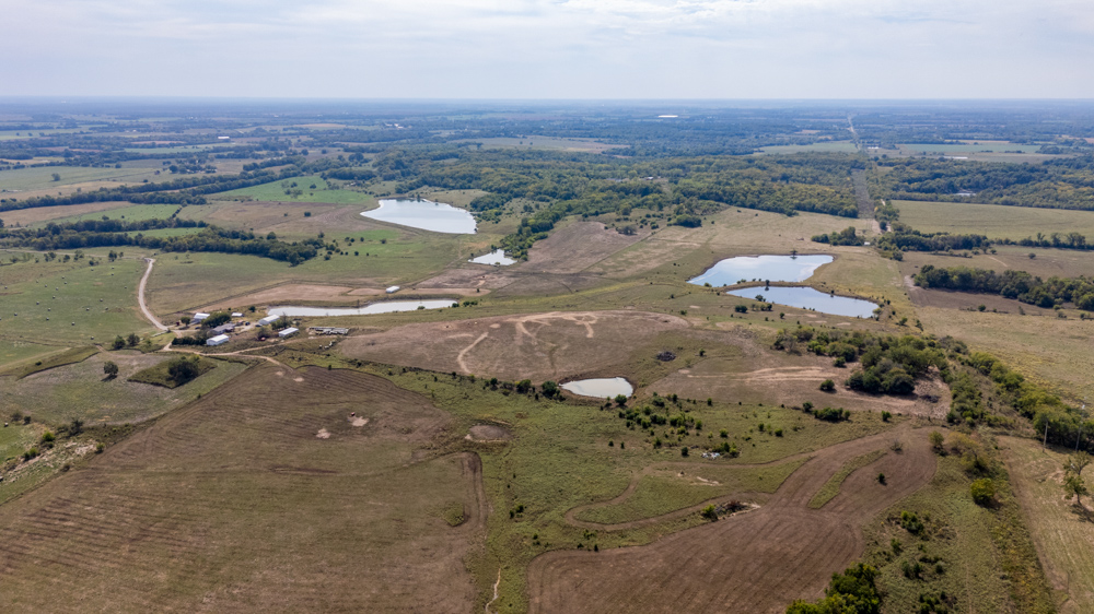 Sprawling Century Farm and Ranch with Pastures, Ponds, Hay Fields, Barns and a Home
