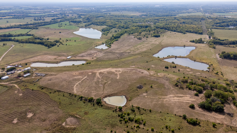 Sprawling Century Farm and Ranch with Pastures, Ponds, Hay Fields, Barns and a Home