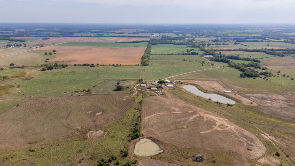 Sprawling Century Farm and Ranch with Pastures, Ponds, Hay Fields, Barns and a Home