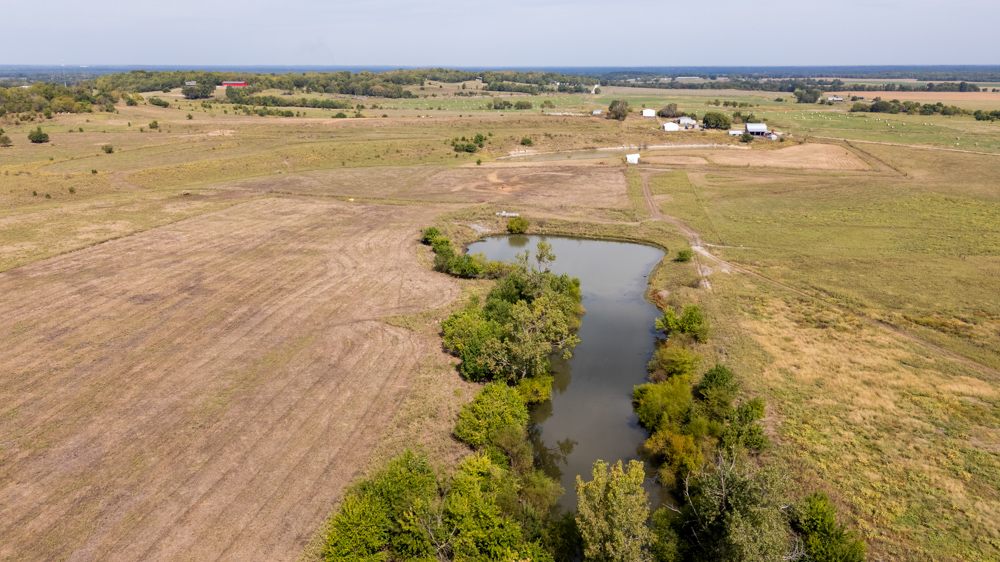 Sprawling Century Farm and Ranch with Pastures, Ponds, Hay Fields, Barns and a Home