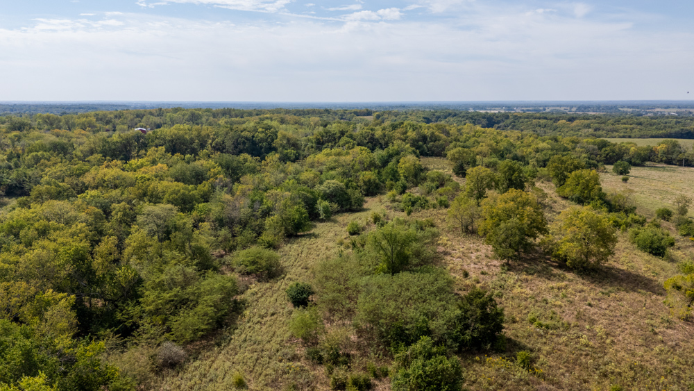 Sprawling Century Farm and Ranch with Pastures, Ponds, Hay Fields, Barns and a Home