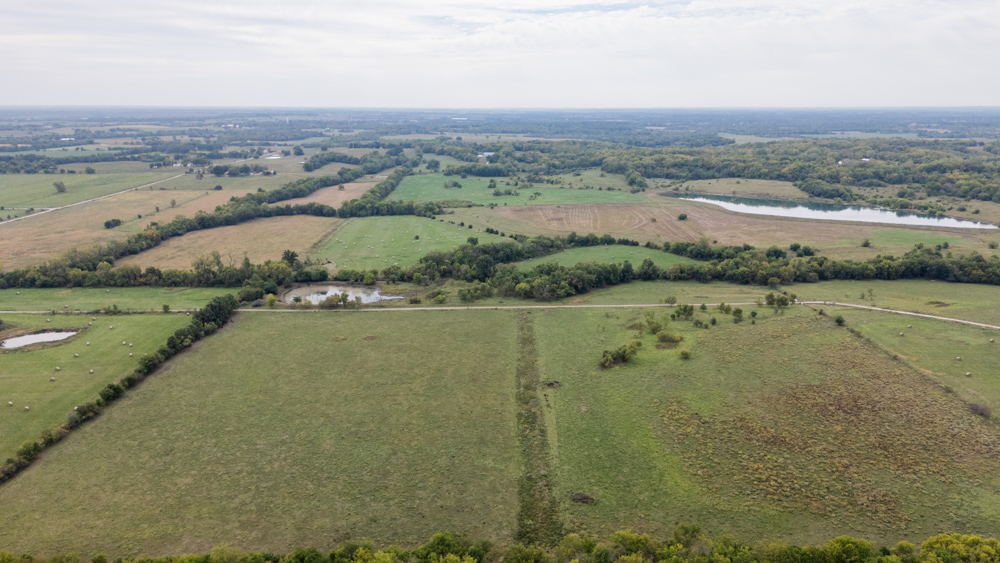 Sprawling Century Farm and Ranch with Pastures, Ponds, Hay Fields, Barns and a Home