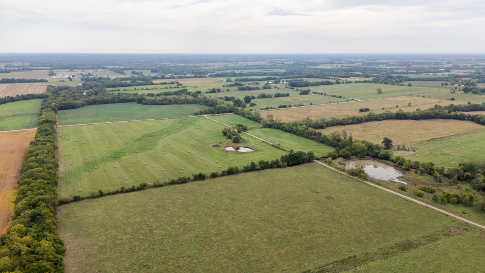 Sprawling Century Farm and Ranch with Pastures, Ponds, Hay Fields, Barns and a Home
