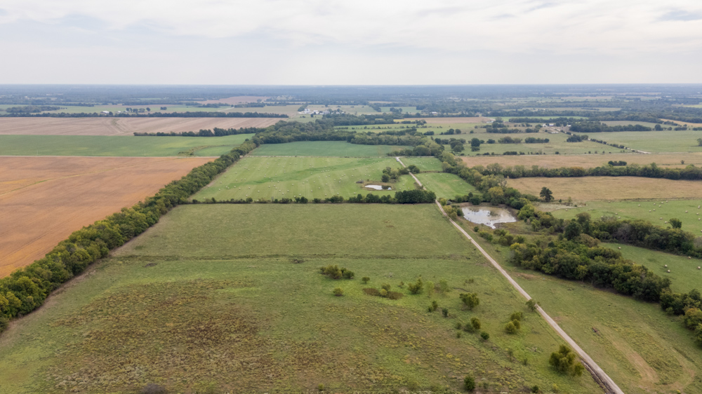 Sprawling Century Farm and Ranch with Pastures, Ponds, Hay Fields, Barns and a Home