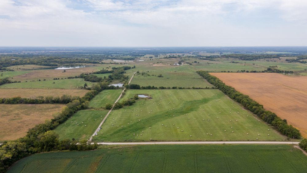 Sprawling Century Farm and Ranch with Pastures, Ponds, Hay Fields, Barns and a Home